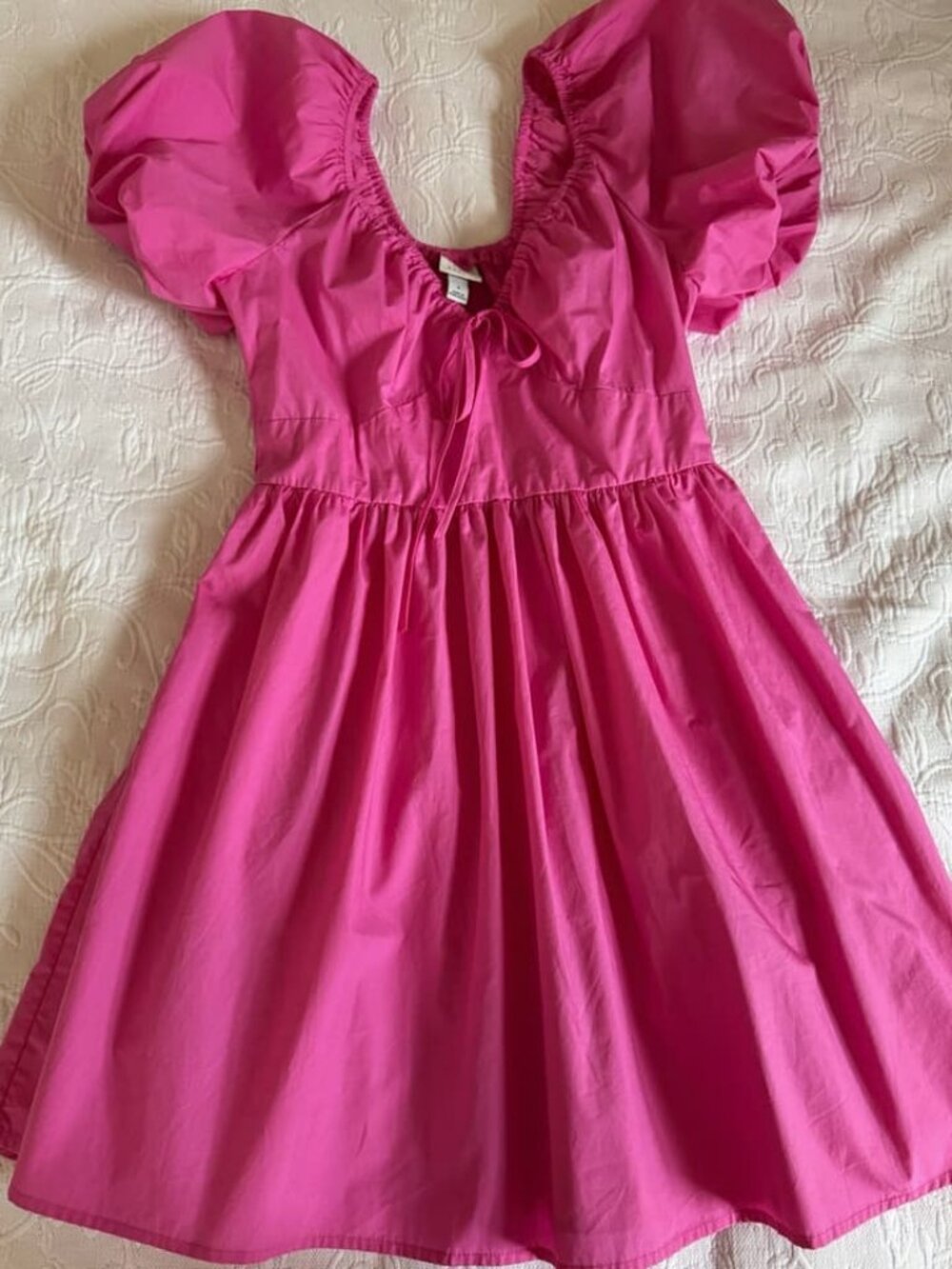 Woman beautiful pink puff sleeve
